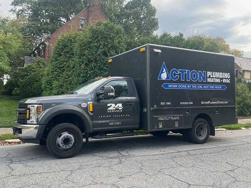 Action Plumbing Heating & HVAC technician on the job